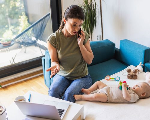 Woman watching over a baby at Atlanta infant sleep specialist at Night Nite Babies